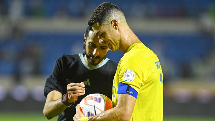 Cristiano Ronaldo collected the match ball after notching a hat-trick against Al-Fateh