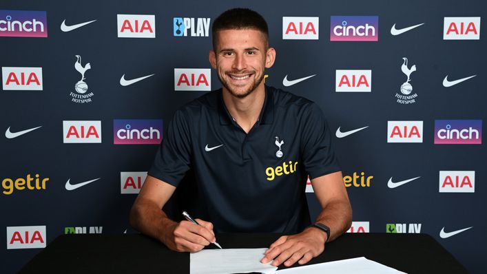 Guglielmo Vicario was all smiles as he signed his contract