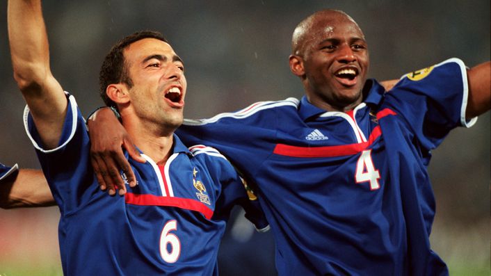 Youri Djorkaeff and Patrick Vieira celebrate winning the Euro 2000 final in Rotterdam