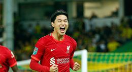 Takumi Minamino celebrates his goal for Liverpool in their Carabao Cup win over Norwich