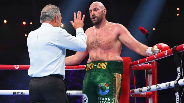 Tyson Fury survived a knockdown to win on points