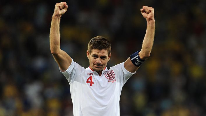 Steven Gerrard celebrates at full-time after setting up England's winner