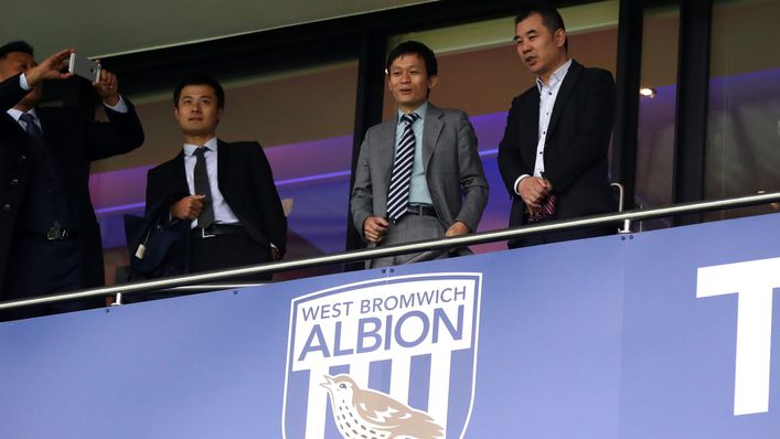 West Brom chairman Guochuan Lai (second from right) is under scrutiny for a loan he received from the club last year