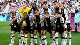 The German national team covered their faces after being threatened with punishment for wearing a rainbow armband