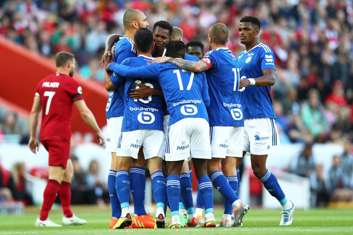 Strasbourg celebrate Habib Diallo's goal against Liverpool at Anfield